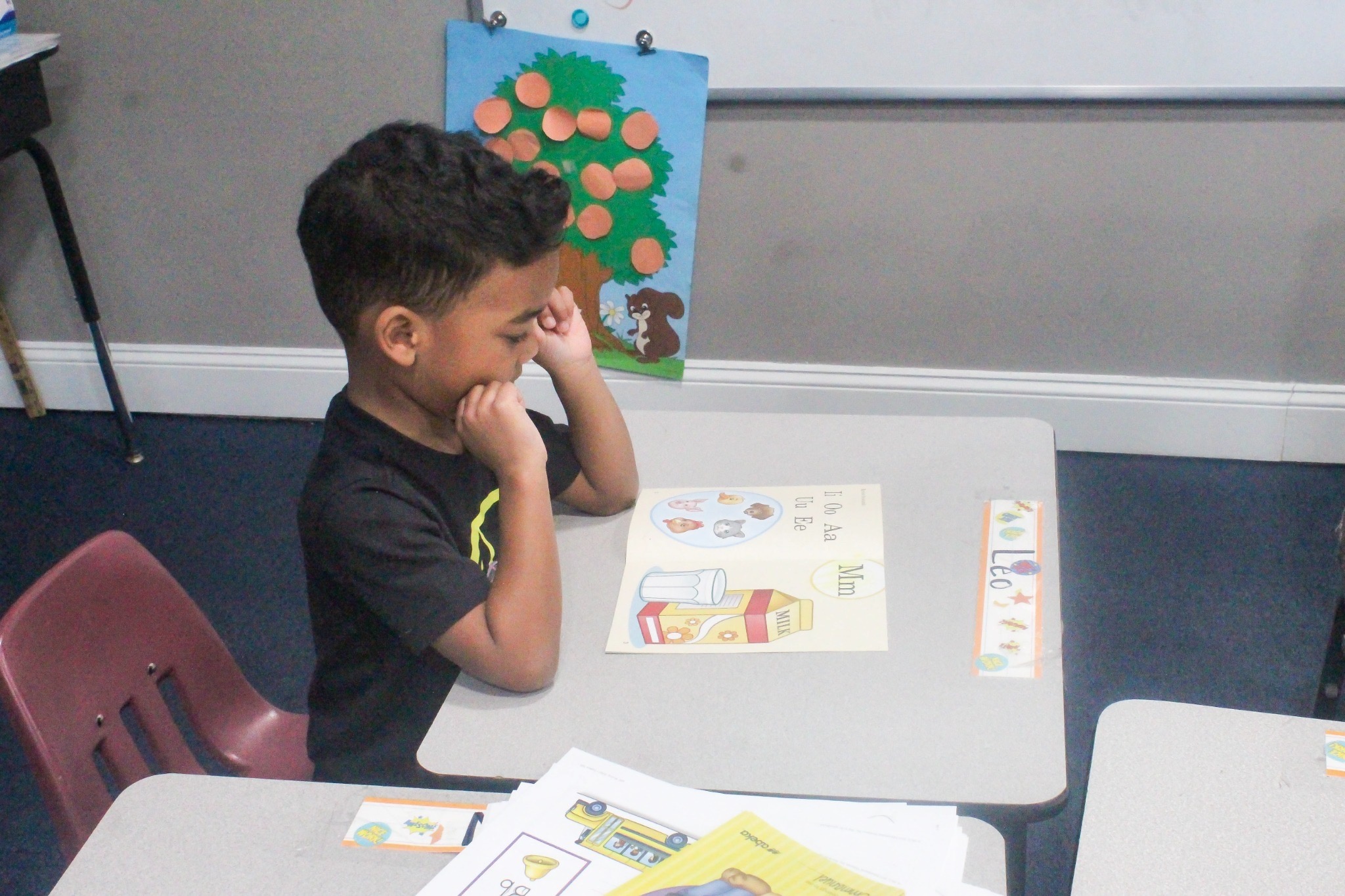 A preschool student working through an Abeka lesson